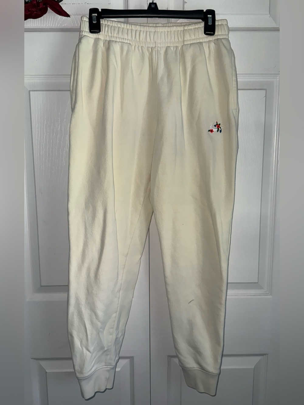 Nike light yellow Sweatpants with Small Multicolor Logo